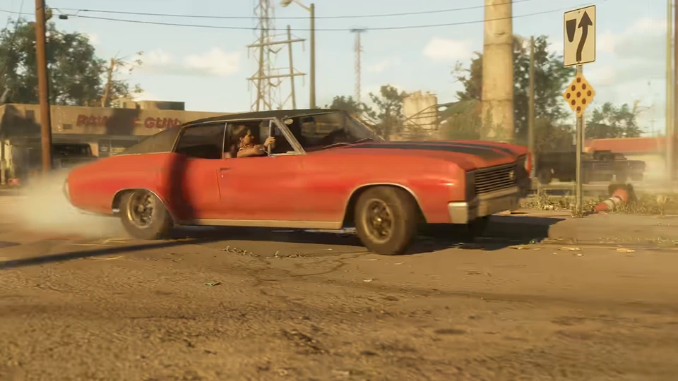Red car, dark roof and hood markings; Pawn & Gun behind · 71.200s
